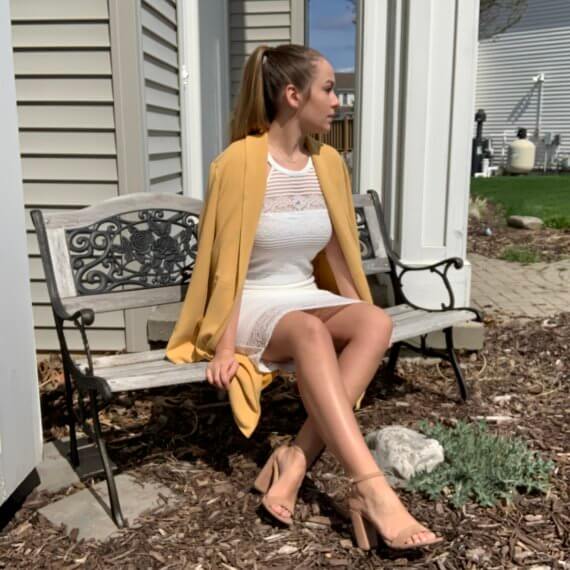 White midi lace dress with halter overlay neckline, mustard midi coat
