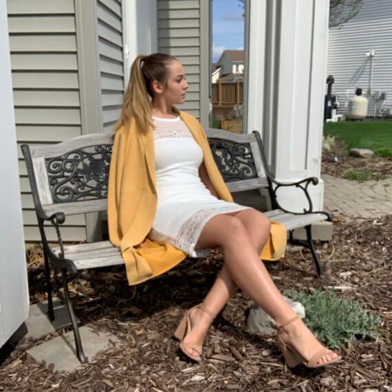 White midi lace dress with halter overlay neckline, mustard midi coat