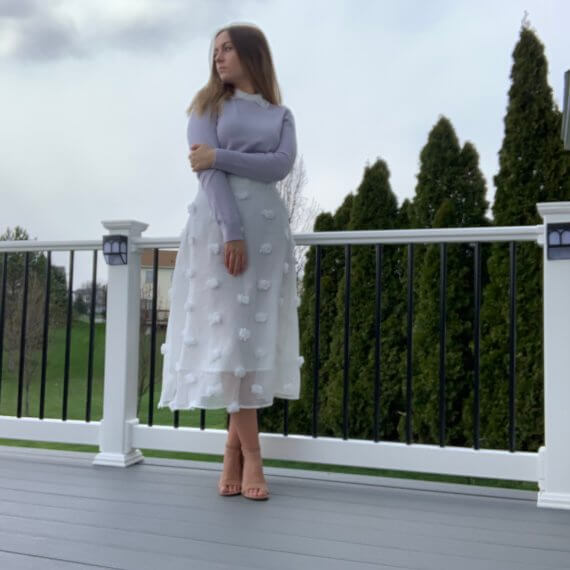 Pastel purple sweater with lace peter-pan collar, midi white a-line skirt with puff details