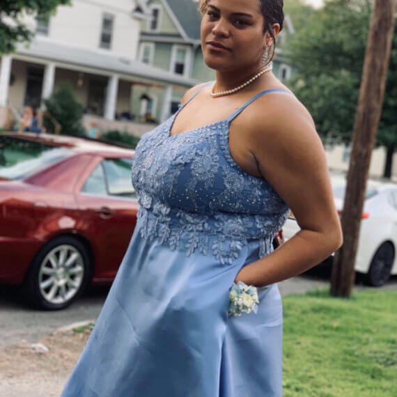 Spaghetti strap sky blue prom gown with floral lace on the bust. Floor-length gown with pockets!