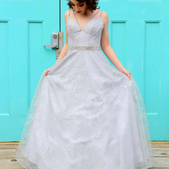 Soft blue/ silver v-neck floor-length gown with silver sequin waistband and spaghetti straps.