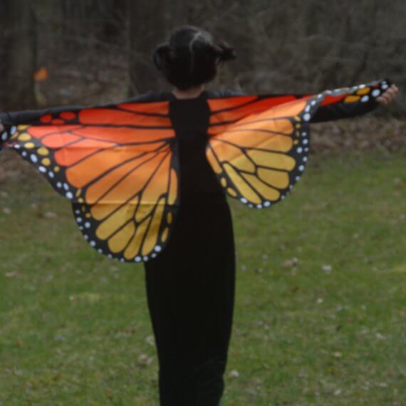 Look #5 Monarch Butterfly in The Backyard Stylist: Chie Kai Outfit: Monarch butterfly cape wings, Long velour skirt, Long black sleeve Shoes: Personal Collection Accessories: Personal Collection Model: Anina Pabros Photographer: Ed Pabros Location: Le Roy, NY