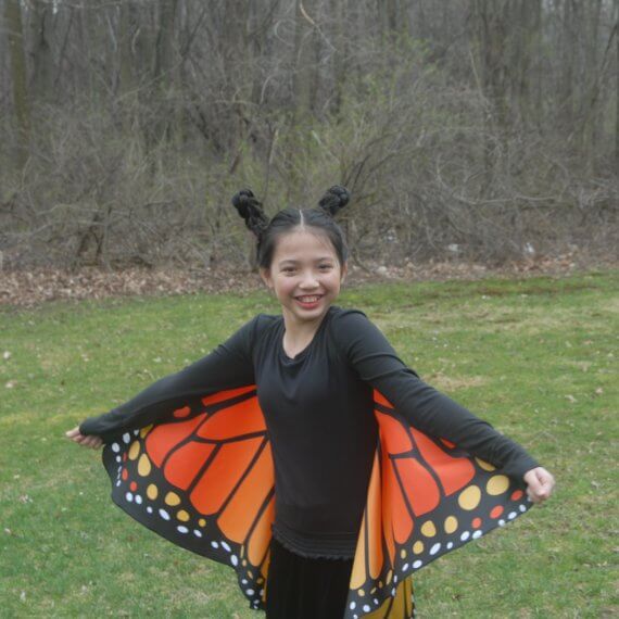 Look #5 Monarch Butterfly in The Backyard Stylist: Chie Kai Outfit: Monarch butterfly cape wings, Long velour skirt, Long black sleeve Shoes: Personal Collection Accessories: Personal Collection Model: Anina Pabros Photographer: Ed Pabros Location: Le Roy, NY