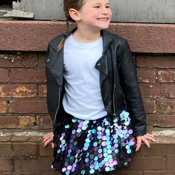 Look #7 Playful Glitter Stylist: Chie Kai Outfit: Mini spangle skirt, White shirtLeather jacket Shoes: Personal Collection Model: Evelyn Mager Photographer: Krysia Mager Location: Batavia, NY