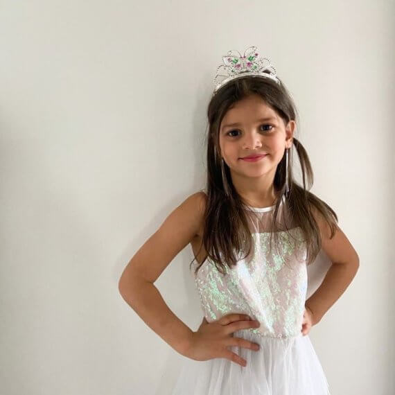 Look #8 Princess Stylist: Chie Kai Outfit: White dress, White fur coat Shoes: Personal Collection Accessories: Personal Collection Model: Reta Adel Photographer: Ayat Aldroobe Location: Medina, NY