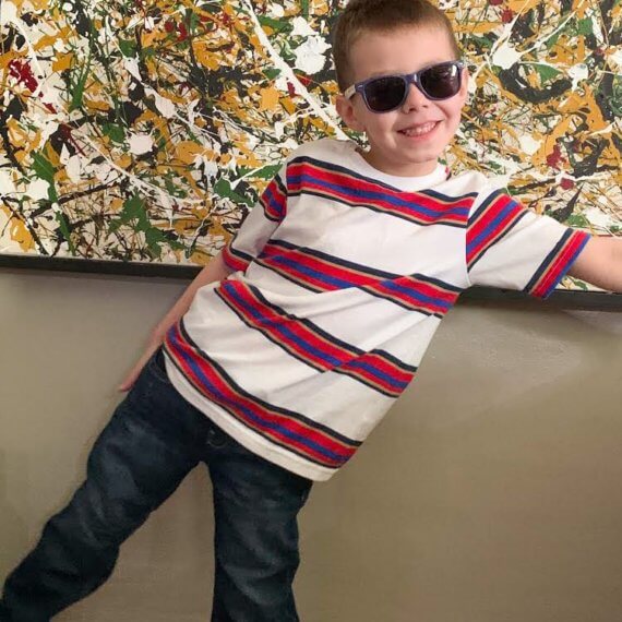 Look #9 Casual Style Stylist: Chie Kai Outfit: Red stripe T - shirt, denim jeans Shoes: Personal Collection Accessories: Personal Collection Model: Liam Weatherall Photographer: Jenny Weatherall Art by: Josh Weatherall Location: Brockport, NY