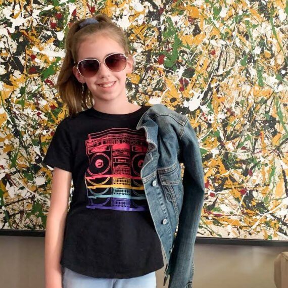 Look #10 Street Style Stylist: Chie Kai Outfit: Rainbow radio T - shirt, skinny pants, denim jacket Shoes: Personal Collection Accessories: Personal Collection Model: Lillian Weatherall Photographer: Jenny Weatherall Art by: Josh Weatherall Location: Brockport, NY