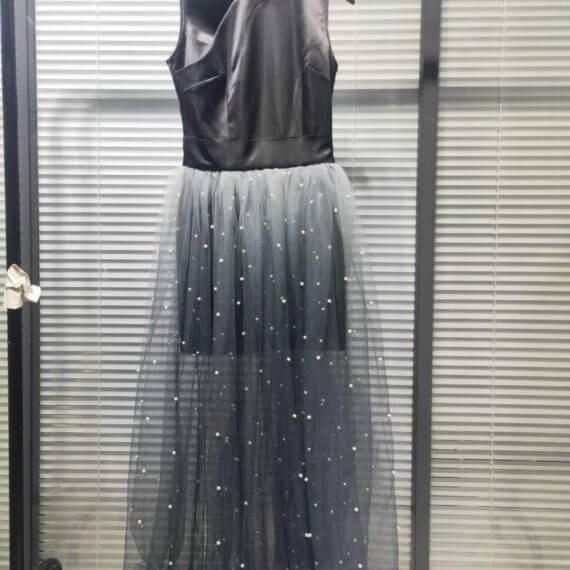 This dress is a black silk satin sleeveless mandarin collared halter shift dress with a white to black ombre silk chiffon pearl beaded long skirt.