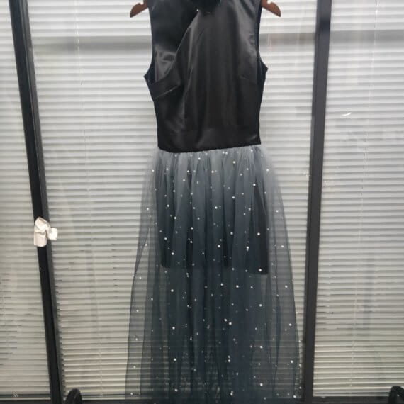 This dress is a black silk satin sleeveless mandarin collared halter shift dress with a white to black ombre silk chiffon pearl beaded long skirt.