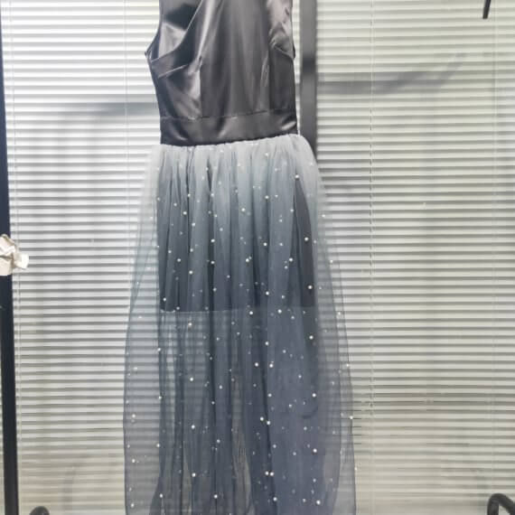 This dress is a black silk satin sleeveless mandarin collared halter shift dress with a white to black ombre silk chiffon pearl beaded long skirt.